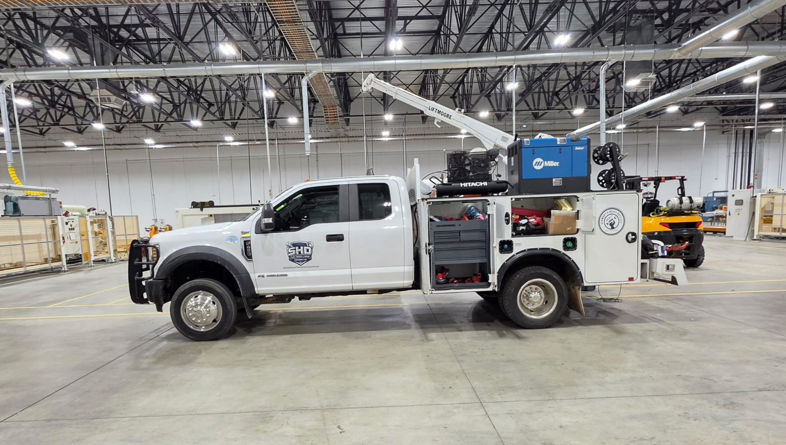 SHD branded service truck on the shop floor